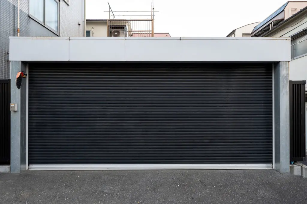 when to repair vs replace garage doors